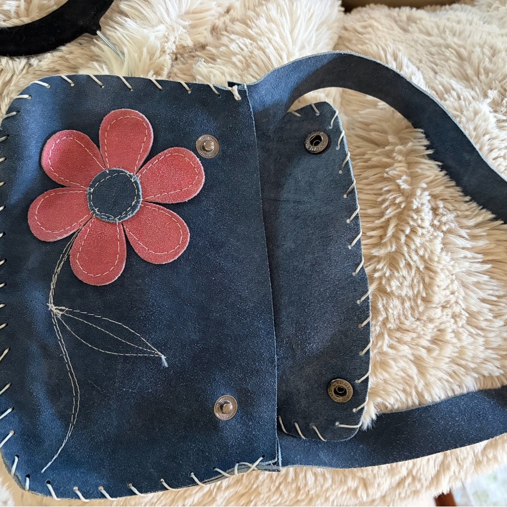 Blue Suede Crossbody Bag with Red Flower Accent